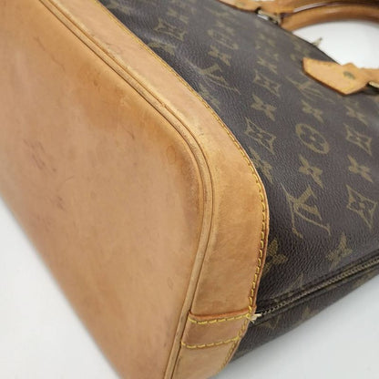 Louis Vuitton Alma Handbag Monogram M51130