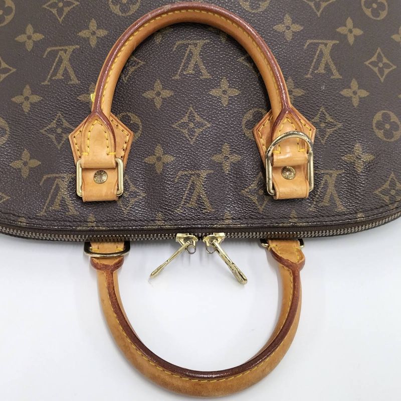 Louis Vuitton Alma Handbag Monogram M51130