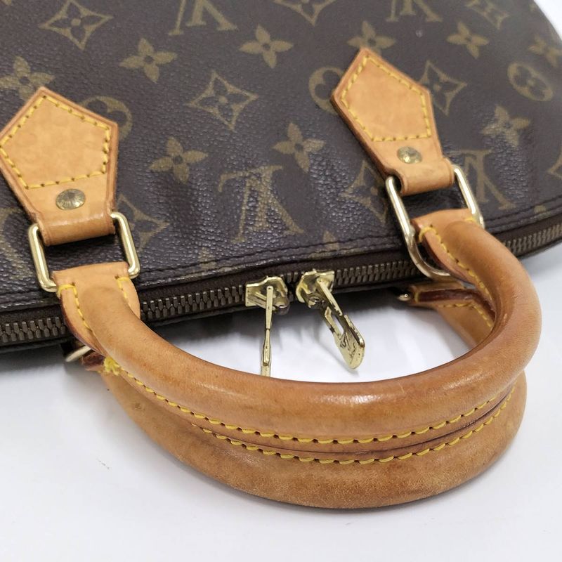 Louis Vuitton Alma Handbag Monogram M51130