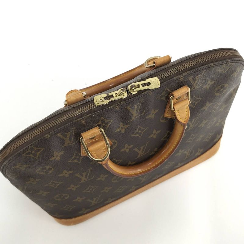 Louis Vuitton Alma Handbag Monogram M51130