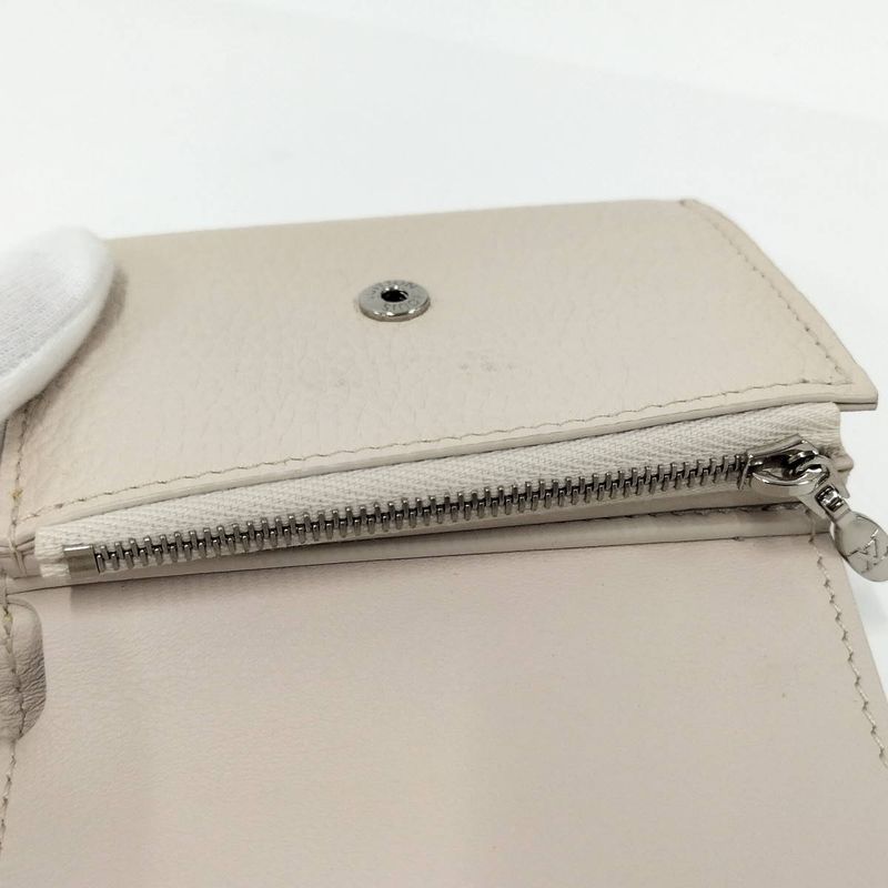 Louis Vuitton Portefeuille Capucines XS Trifold Wallet M80325