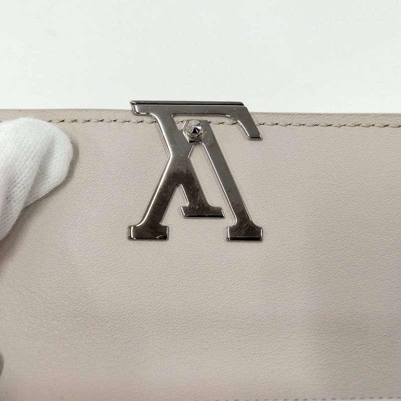 Louis Vuitton Portefeuille Capucines XS Trifold Wallet M80325