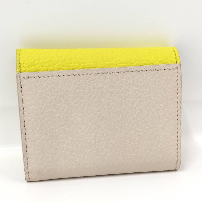 Louis Vuitton Portefeuille Capucines XS Trifold Wallet M80325