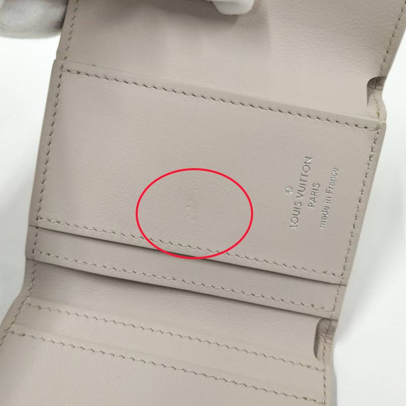 Louis Vuitton Portefeuille Capucines XS Trifold Wallet M80325
