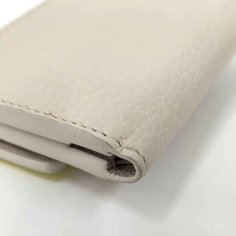 Louis Vuitton Portefeuille Capucines XS Trifold Wallet M80325