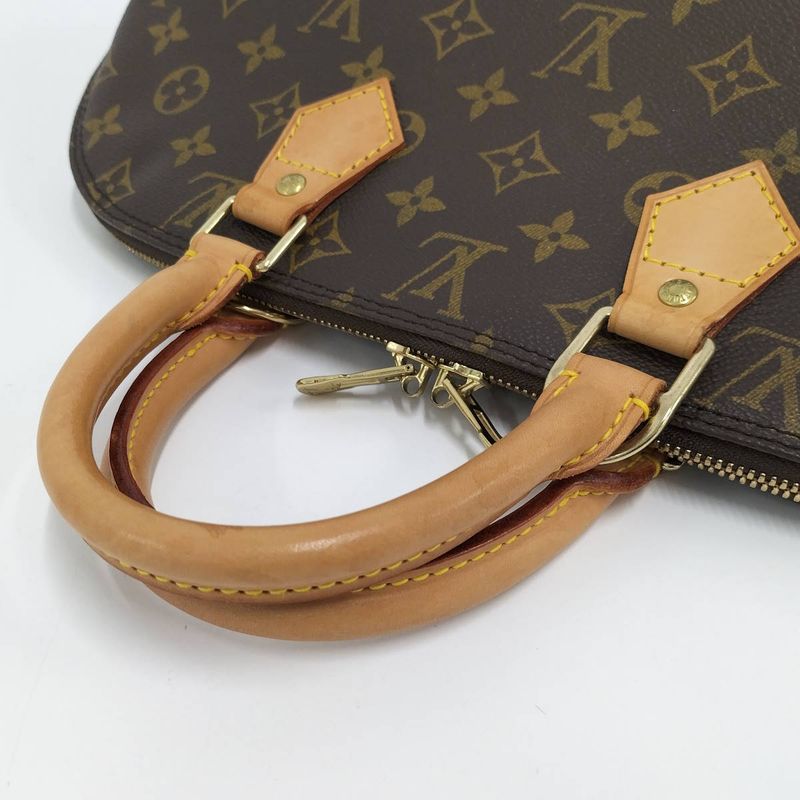 Louis Vuitton Alma Monogram Handbag M51130