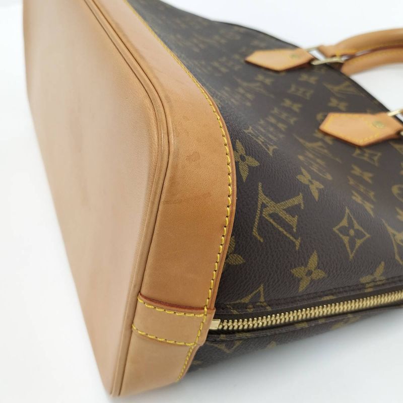 Louis Vuitton Alma Monogram Handbag M51130