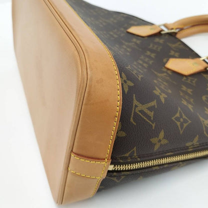 Louis Vuitton Alma Monogram Handbag M51130
