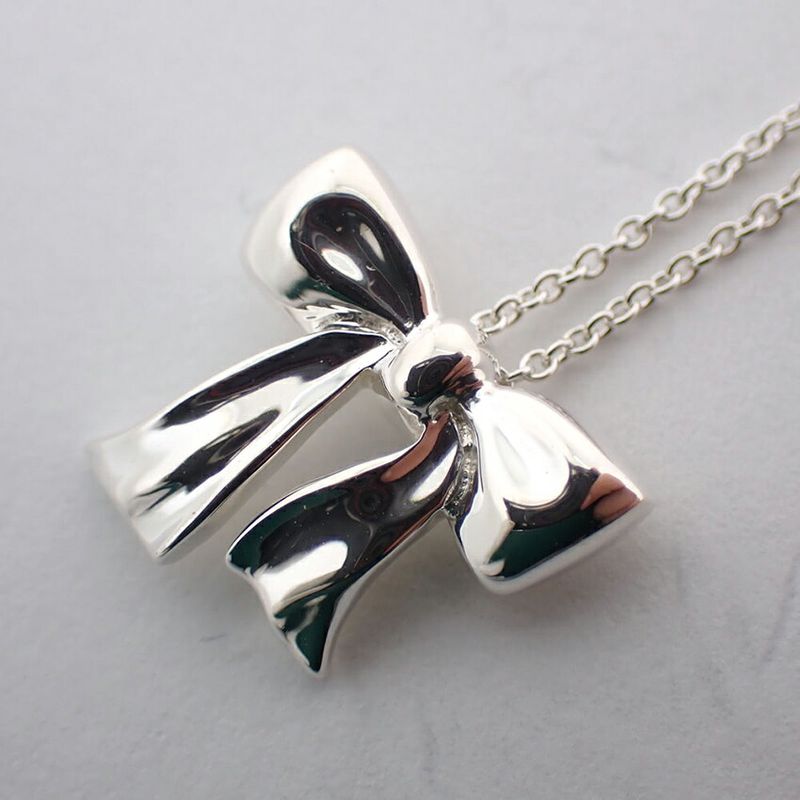 Tiffany & Co 925 Ribbon Pendant Necklace J100-8
