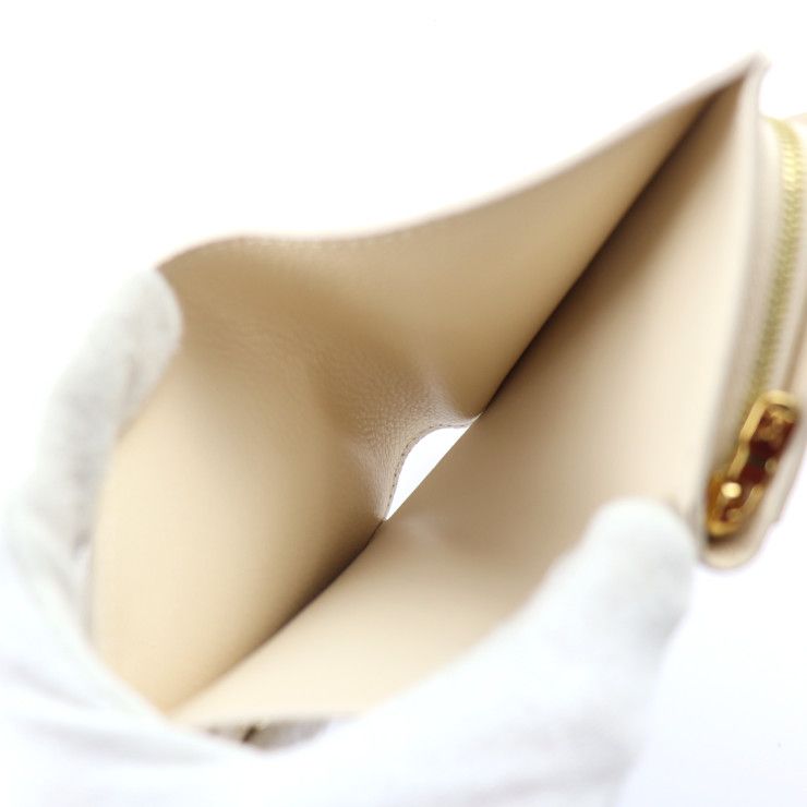 Louis Vuitton Portefeuille Cles A Wild At Heart Bifold Wallet M80754 Embossed