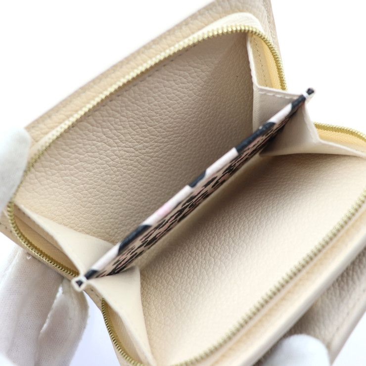 Louis Vuitton Portefeuille Cles A Wild At Heart Bifold Wallet M80754 Embossed