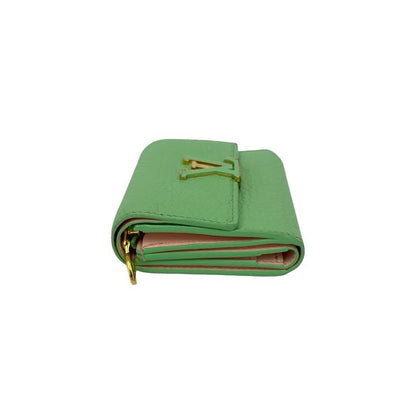 Louis Vuitton Portefeuille Capucines XS Leather