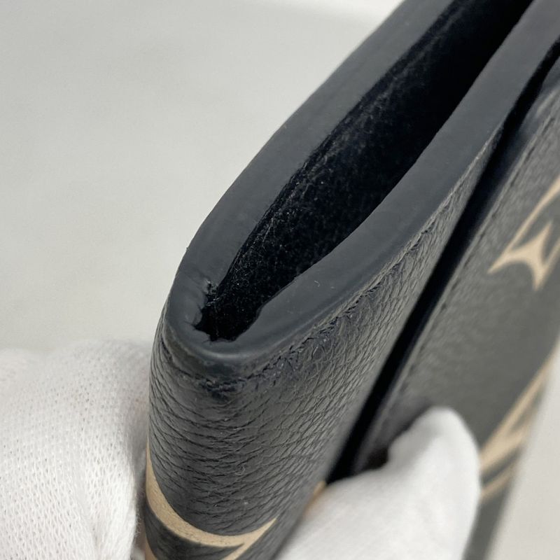 Louis Vuitton Long Wallet Monogram/empreinte Bicolor Portefeuille Emily M83138