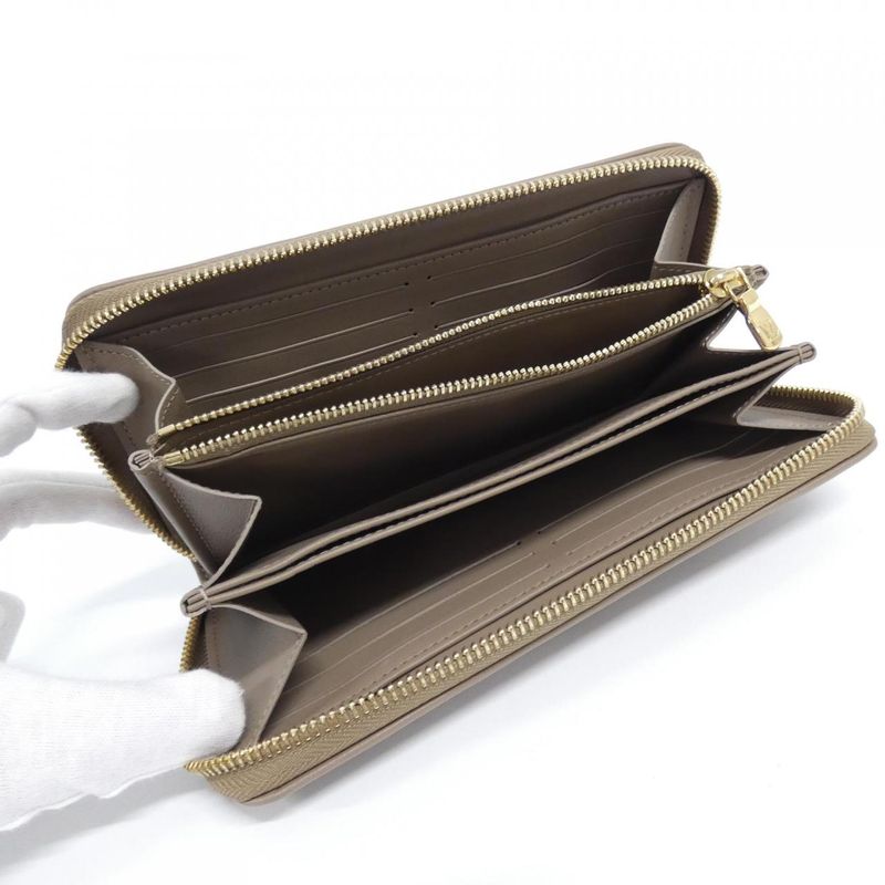 Louis Vuitton Couss in Zippy Wallet M81511 Wallet