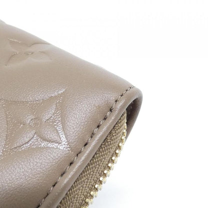 Louis Vuitton Couss in Zippy Wallet M81511 Wallet