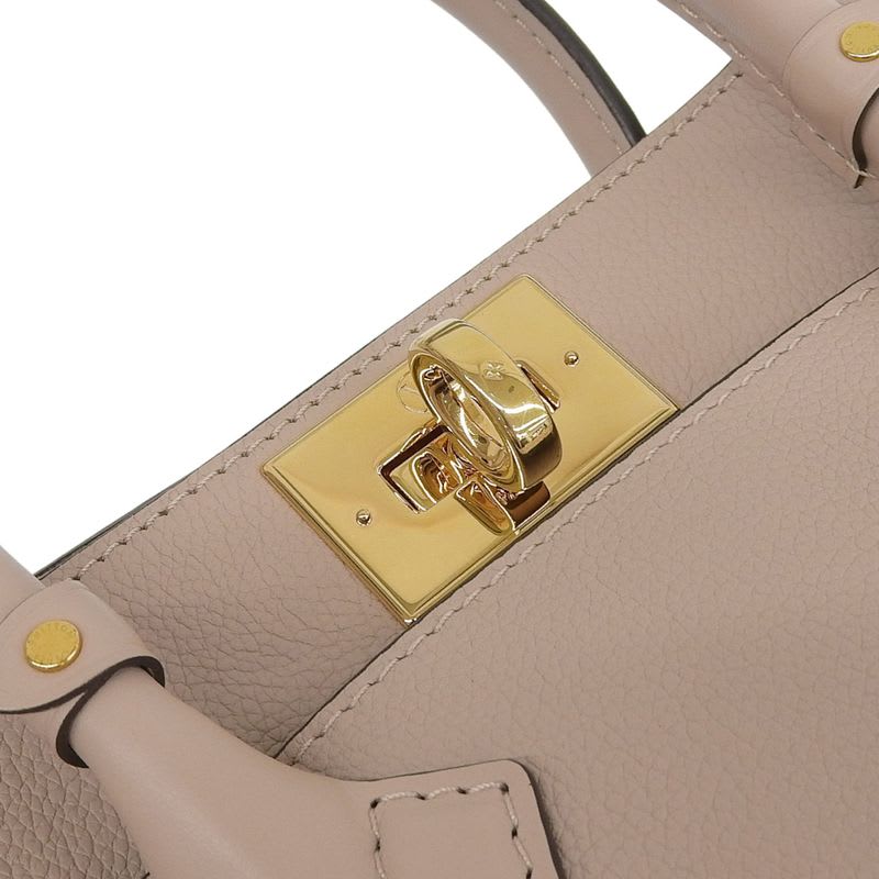 Louis Vuitton On My Side PM Shoulder Bag