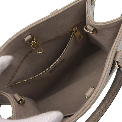Louis Vuitton Monogram Empreinte On The Go PM Shoulder Bag