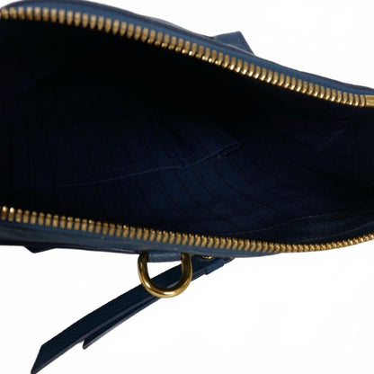 Louis Vuitton Petillant Clutch Bag Empreinte Blue M93427