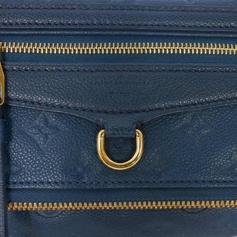 Louis Vuitton Petillant Clutch Bag Empreinte Blue M93427