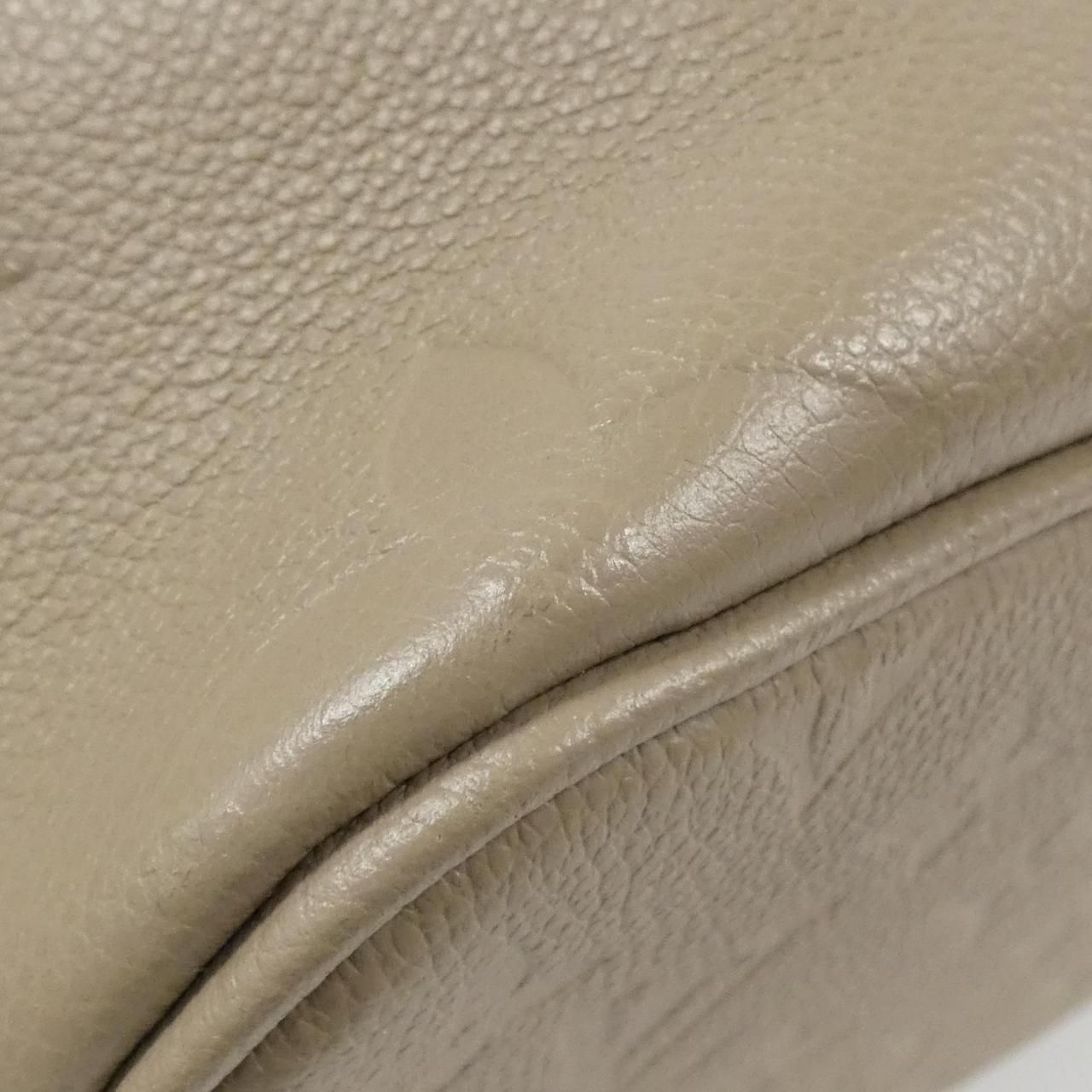 Louis Vuitton Monogram Empreinte Neverfull Mm M45686 Bag