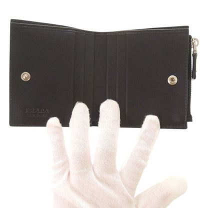 Prada Logo Compact Wallet Brushed Leather Black Bifold Wallet Black 0352 Prada