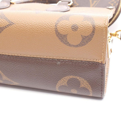 Louis Vuitton Handbag On The Go EW Monogram Giant Monogram Reverse M46653 PVC