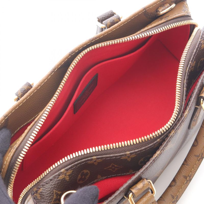 Louis Vuitton Handbag on the Go Ew Monogram Giant Monogram Reverse M46653 PVC