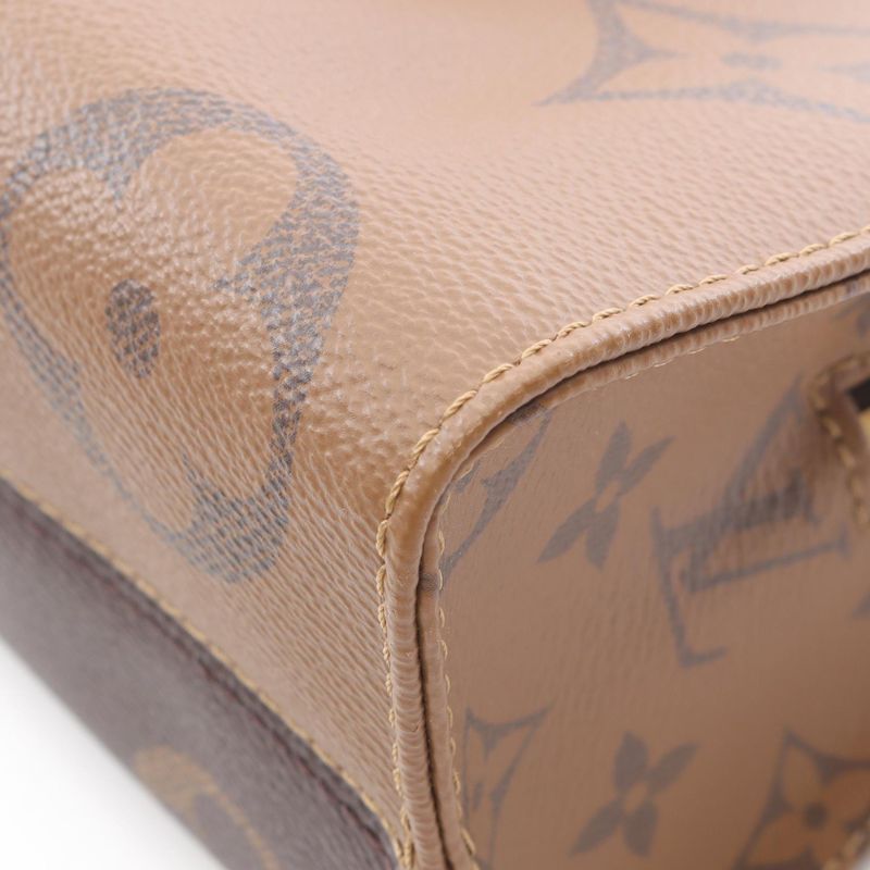 Louis Vuitton Handbag on the Go Ew Monogram Giant Monogram Reverse M46653 PVC