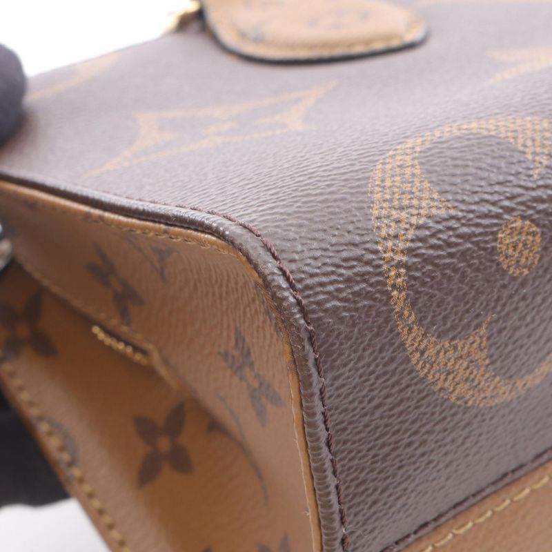 Louis Vuitton Handbag on the Go Ew Monogram Giant Monogram Reverse M46653 PVC