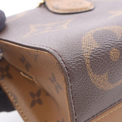 Louis Vuitton Handbag on the Go Ew Monogram Giant Monogram Reverse M46653 PVC