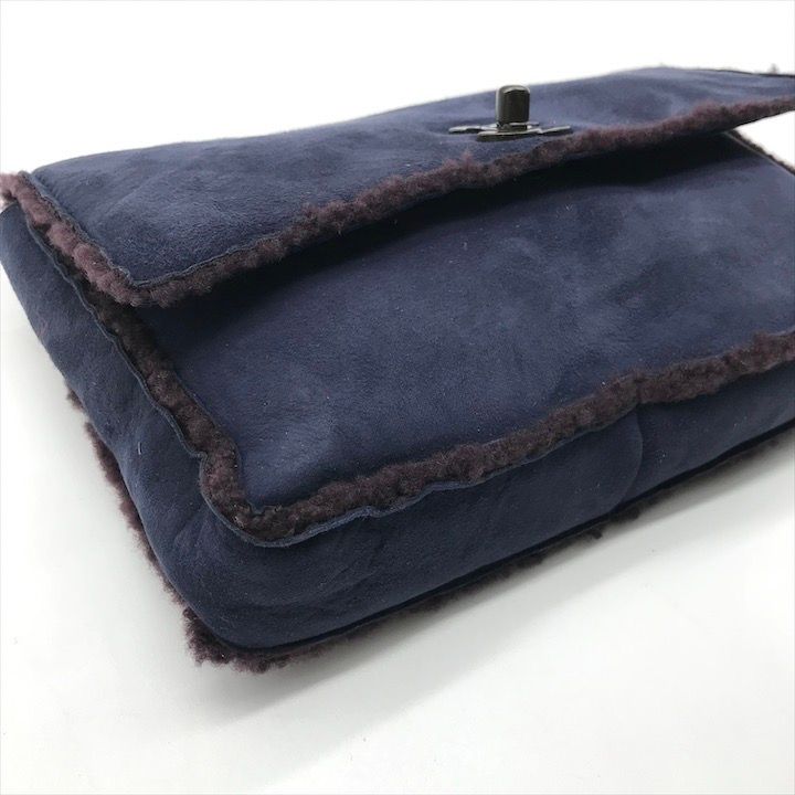Chanel CC Logo Turnlock Mouton Hand Clutch Navy