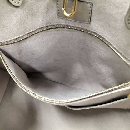 Louis Vuitton On The Go MM 2-Way Handbag Bicolor Monogram Empreinte Tourtrail
