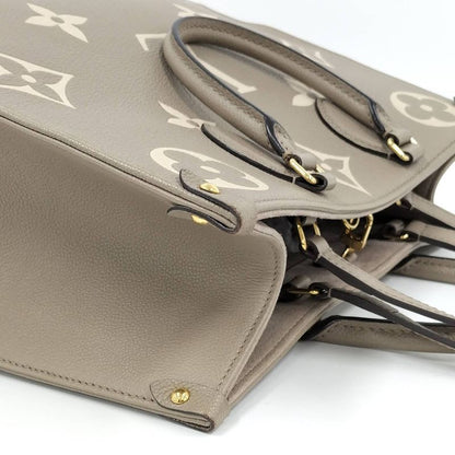 Louis Vuitton On The Go MM 2-Way Handbag Bicolor Monogram Empreinte Tourtrail