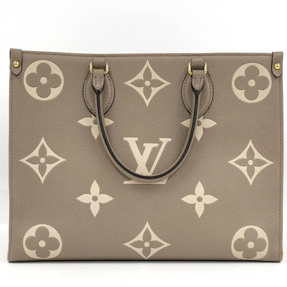 Louis Vuitton On The Go MM 2-Way Handbag Bicolor Monogram Empreinte Tourtrail