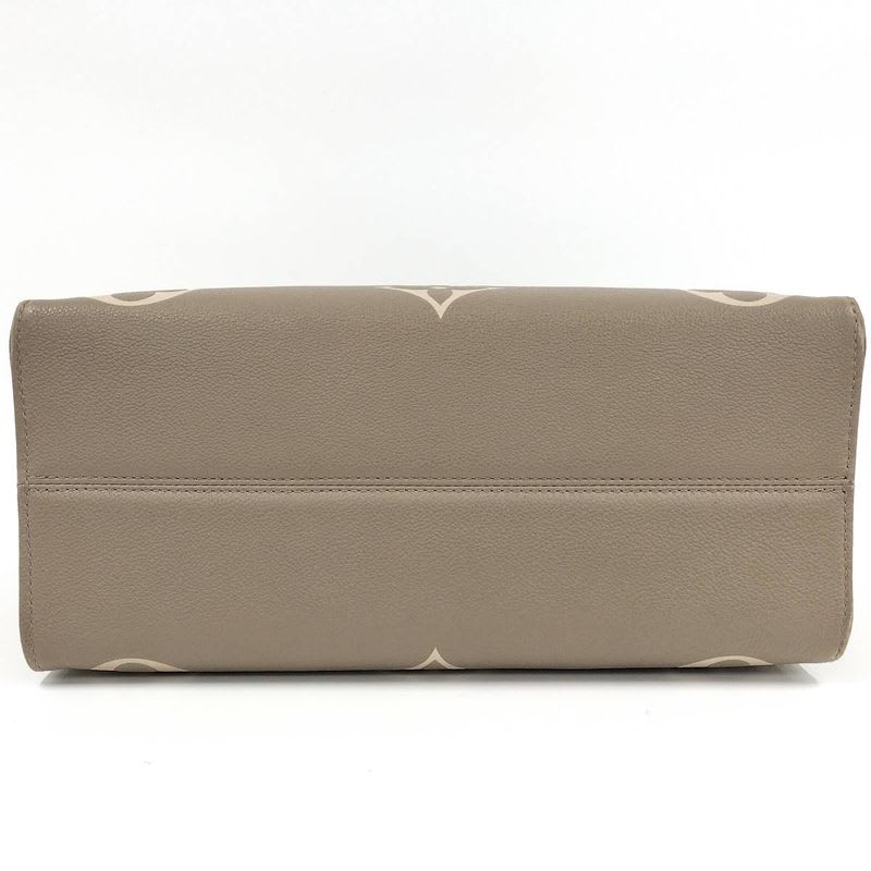 Louis Vuitton On The Go MM 2-Way Handbag Bicolor Monogram Empreinte Tourtrail