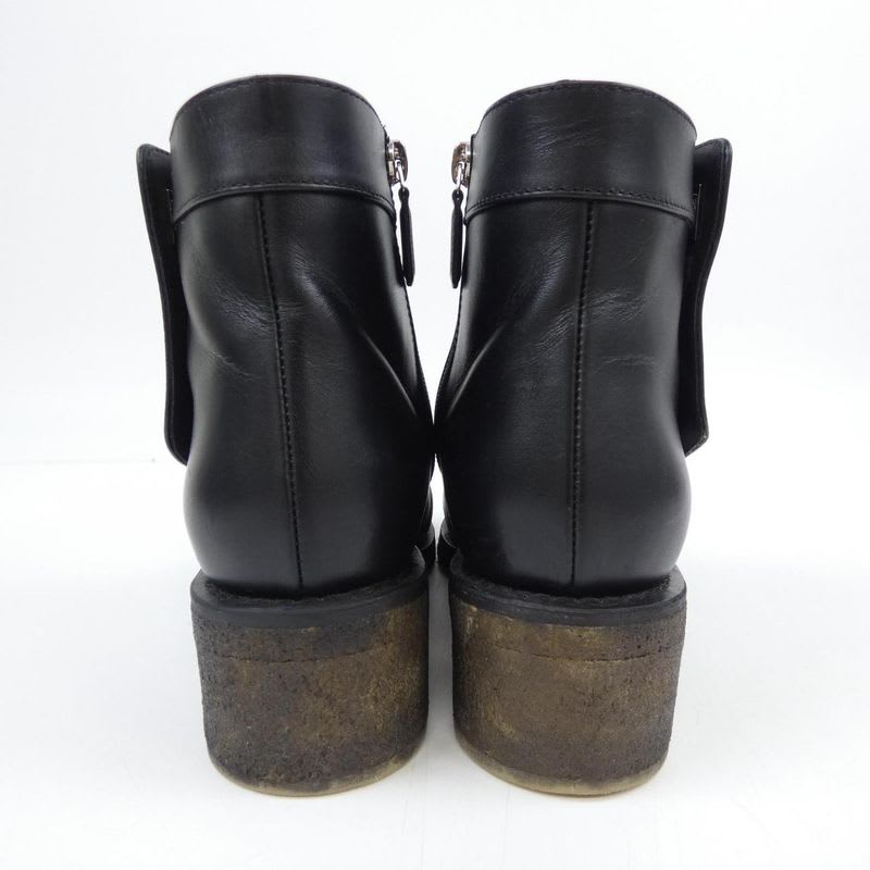 Chanel Turnlock Boots