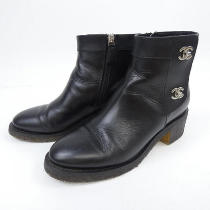 Chanel Turnlock Boots