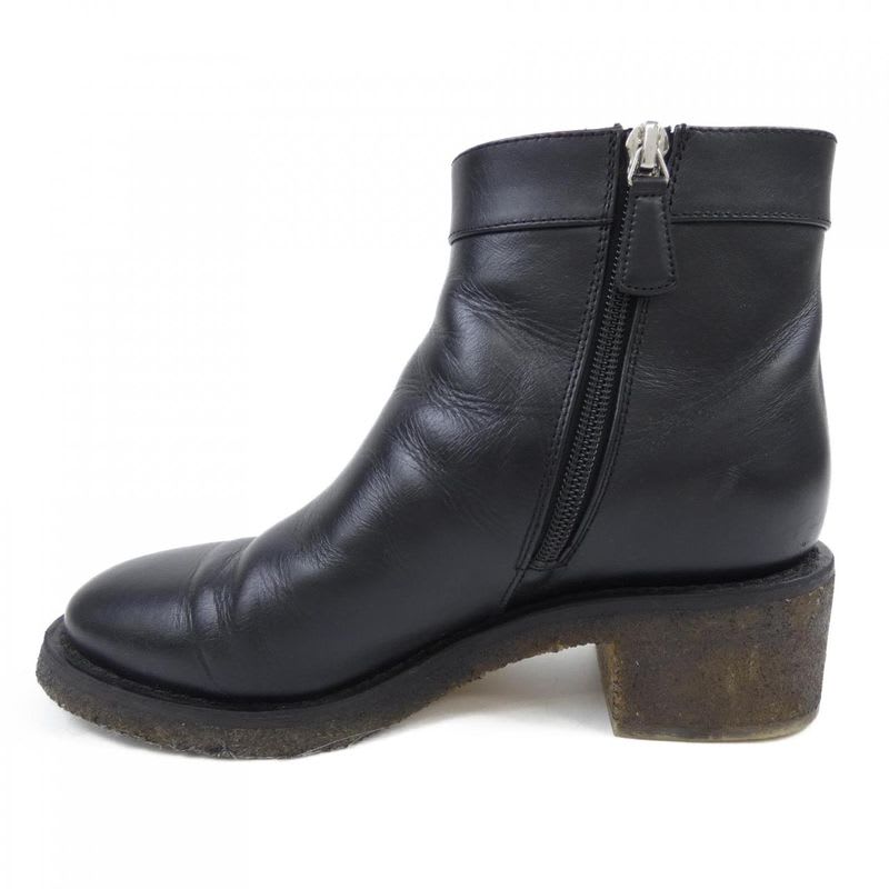 Chanel Turnlock Boots