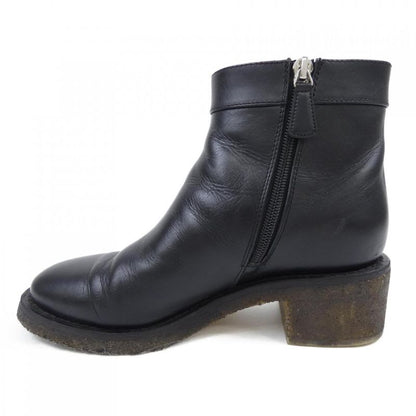 Chanel Turnlock Boots