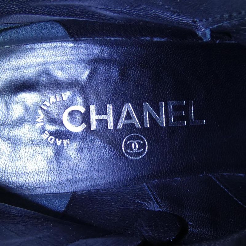 Chanel Turnlock Boots