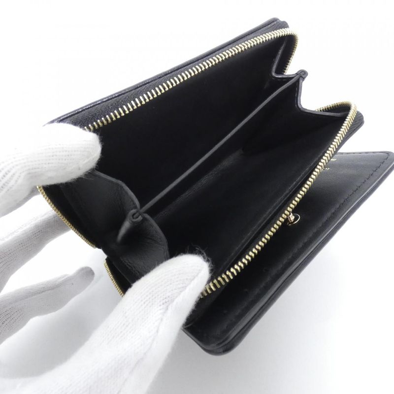 Louis Vuitton Cousin Portefeuille Lou M81599 Wallet