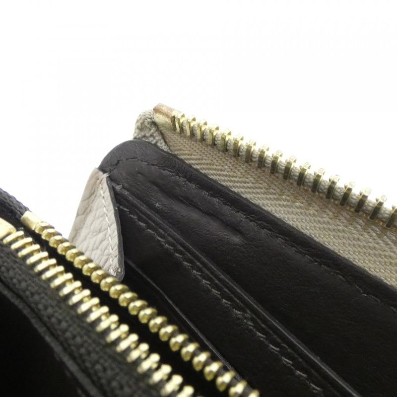Louis Vuitton Taurillon Portefeuille Comet Wallet