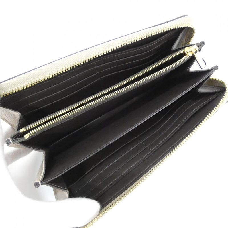 Louis Vuitton Taurillon Portefeuille Comet Wallet