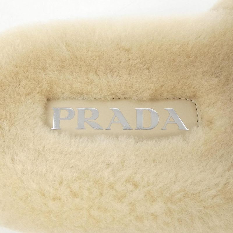 Prada Triangle Logo Shearling Slides 1 Xx662 Sandals