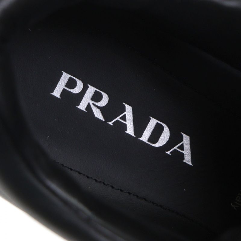 Prada 2ee386 Fly Block Padded Nappa Leather Triangle Logo Triangle Plate Low