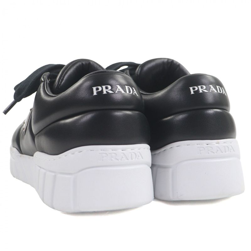 Prada 2ee386 Fly Block Padded Nappa Leather Triangle Logo Triangle Plate Low