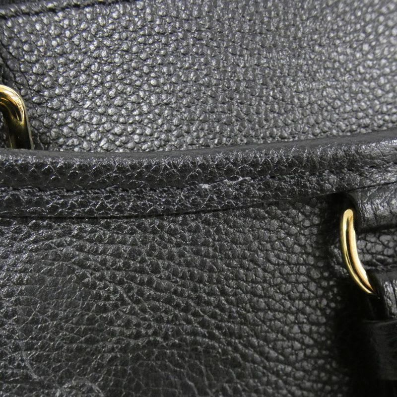 Louis Vuitton Monogram Empreinte Trianon MM Bag