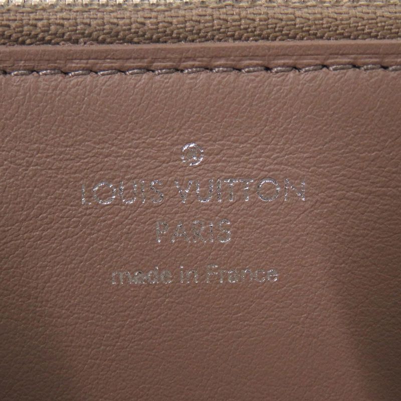 Louis Vuitton Portefeuille Comet M63103 Taurillon Leather Magnolia Pink