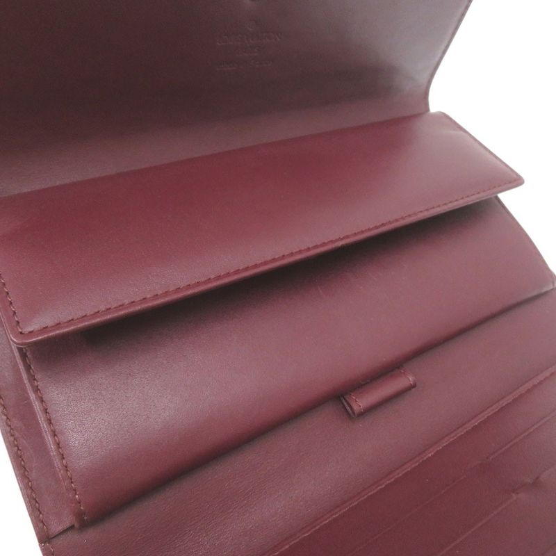 Louis Vuitton Porte Tresor International Trifold Wallet Monogram M65106