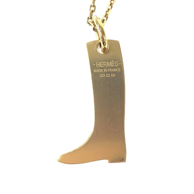 HERMES Amulet Marokinier Gold Black Metal Buffalo Horn Necklace Pendant Women's